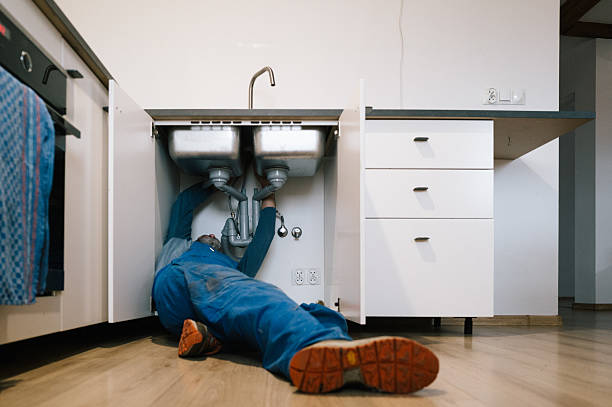 Professional Plumbing technician working in Austin, IN